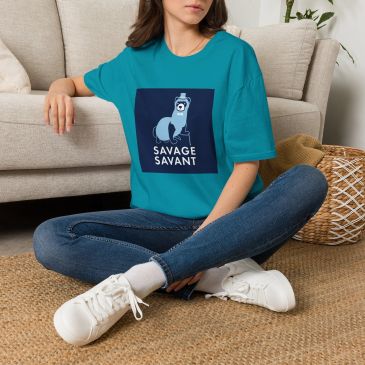 Woman sitting wearing a teal t-shirt with a dog graphic.