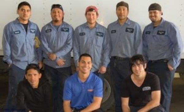 A Group Photo of a Group of Repair Team