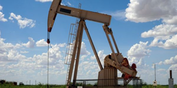 Oil drilling equipment with blue sky background