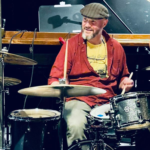 Hank Wheeler Drums and Percussion player.  Playing drums at a gig.
