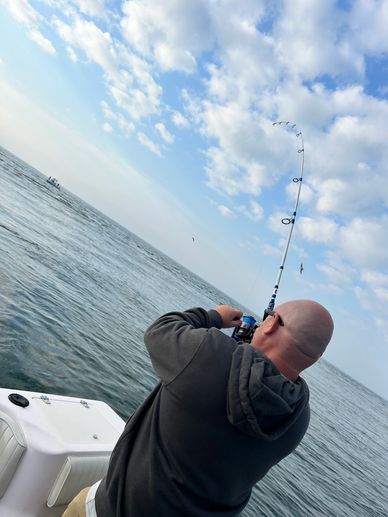 Customer fishing his first ever striper 