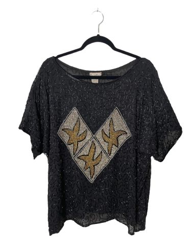 Black short-sleeve shirt with three bird designs on front, hanging on black hanger.