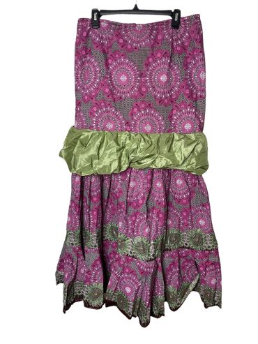 Colorful patterned skirt with green ruffle detail.