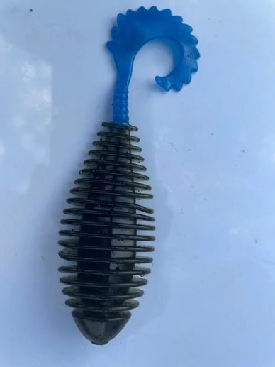 Blue and black fishing lure with ribbed design.