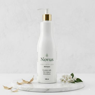 Novus shampoo bottle with floral decoration.