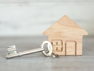 Wood small House and metal Key 