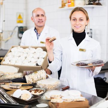 Bakery employees wearing name badges provided by Classic Identity, an online name badge store.