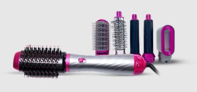Hair styling tool with multiple attachments.