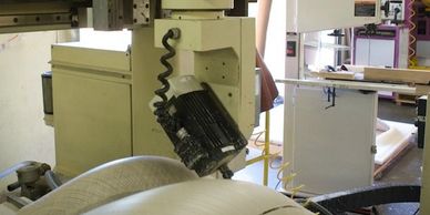 Large thermoformed clear plastic part being trimmed by a 5 axis CNC machine