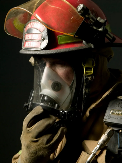 Fireman with mask on.