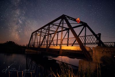 Nightscape of an abandoned Alberta bridge.