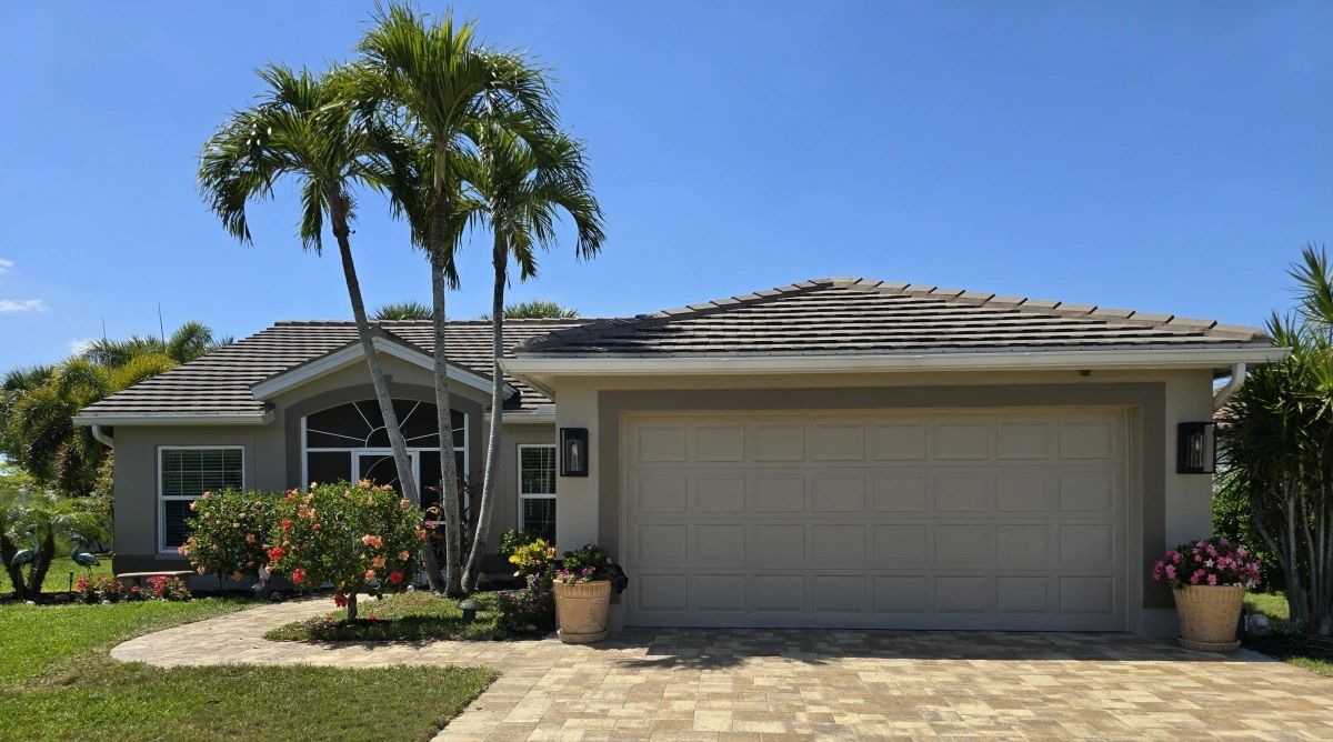 Florida Home Exterior
"Florida home exterior, painted and landscaped, ready for seasonal residents."