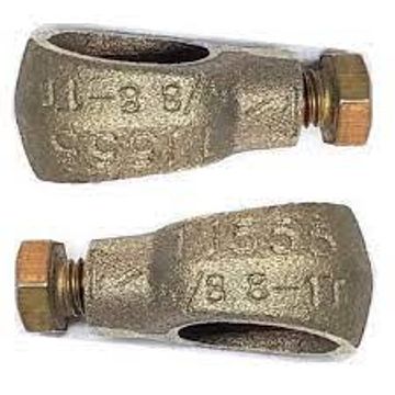 Two metal cable lugs with bolts for electrical connections.