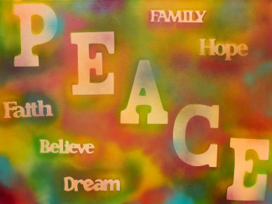 Colorful background with words promoting peace and positivity.