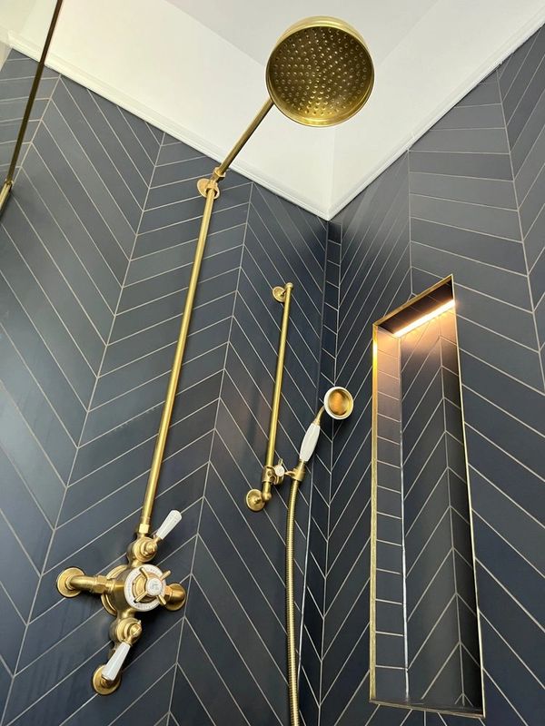 navy blue chevron tiles in a wetroom walls