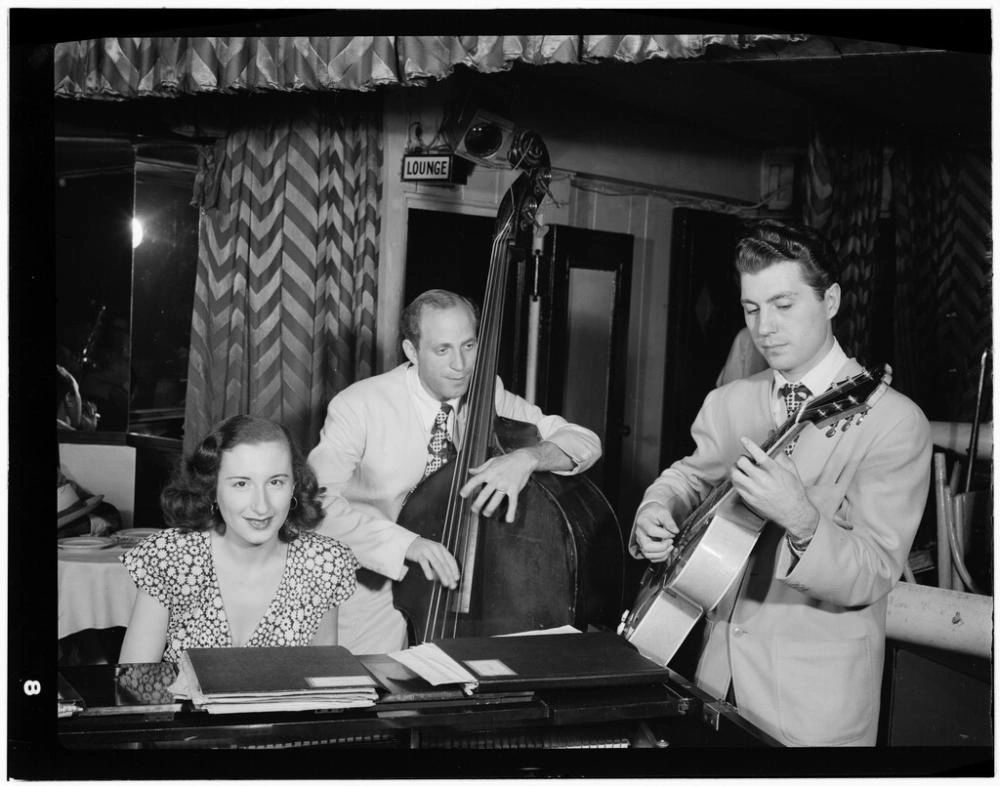 Barbara Carroll, Clyde Lombardi, and Chuck Wayne at the Downbeat, New York City, 1947 Barbara Carroll, Clyde Lombardi, and Chuck Wayne at the Downbeat, New York City, 1947