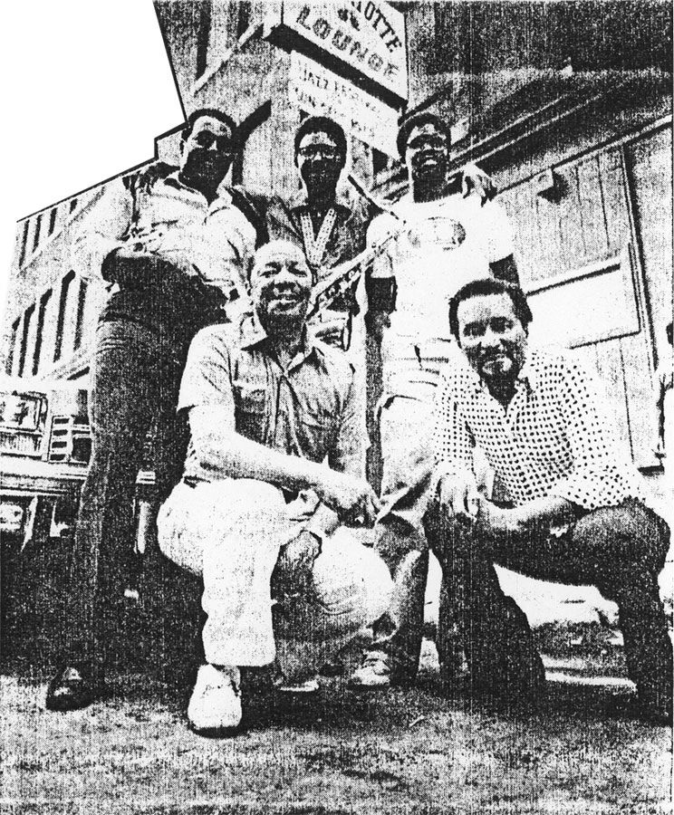 Reggie Walley and Bunny Price, foreground; Teddy Blandon, Harvie Williams, and Terry Collins, outside The Hottentotte Lounge