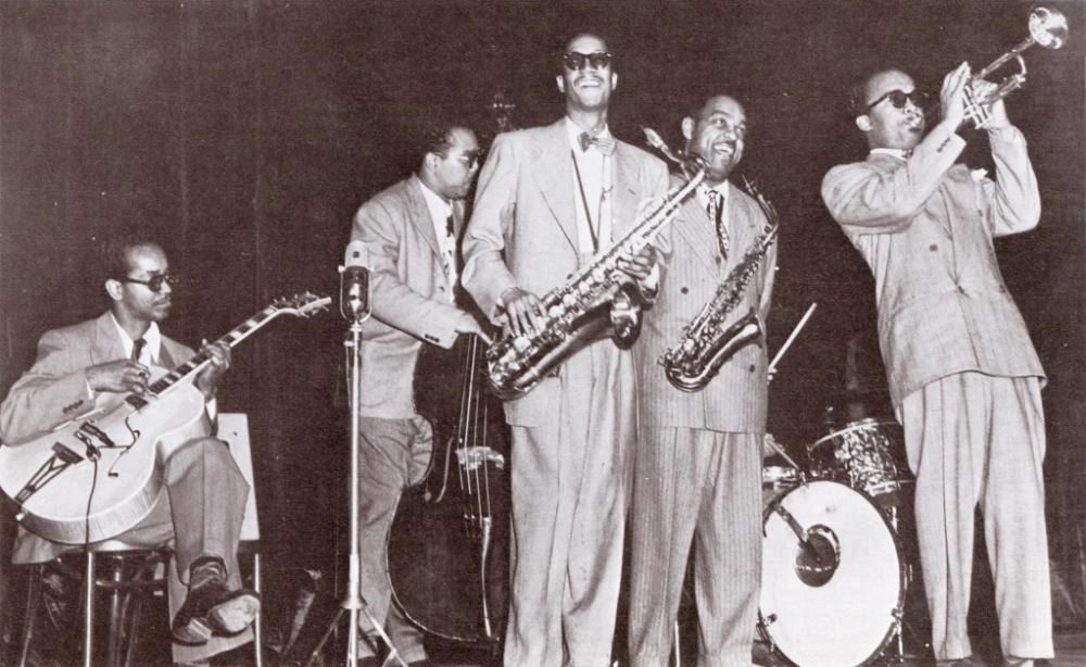 Looking up at a front  line of Wardell Gray, Benny Carter, and Howard McGhee, Pasadena, CA, 1947