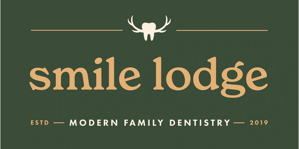 Smile Lodge Dental official logo is a tooth with antlers, mercer, Wisconsin