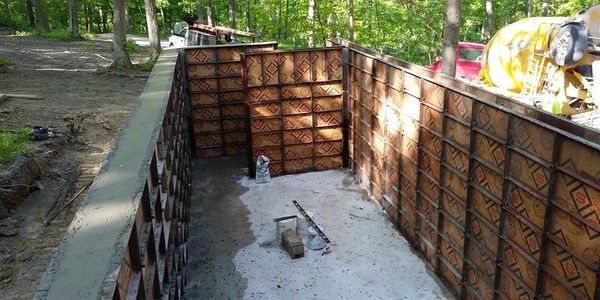 Concrete foundation and walls.