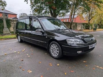 hearse
limousine
funeral car for sale
cheap funeral vehicles
ambulance
first call
wheel bier
hearses