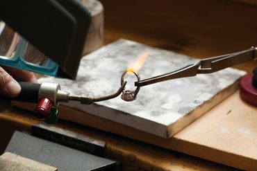 Ring being treated with fire.