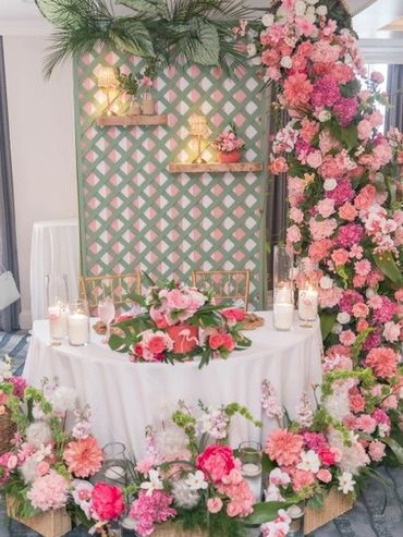 Pink and green wedding floral installation