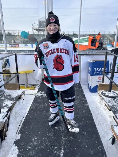 Stillwater’s Senior Forward Hunter Reardon showing support with Teal tape and a Sophie’s Squad sticker on her stick.