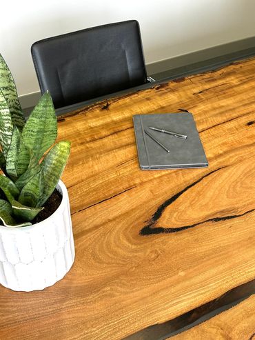 Marri boardroom table with transparent black resin 