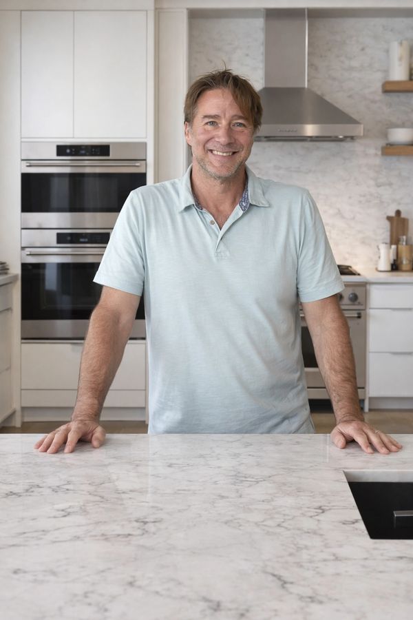 Anthony with beautiful white modern kitchen cabinets in Pittsburgh, Pa.