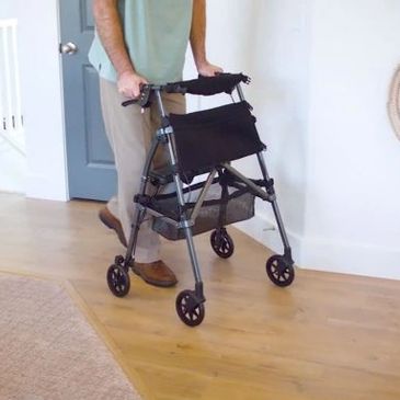 male patient walking using a walker