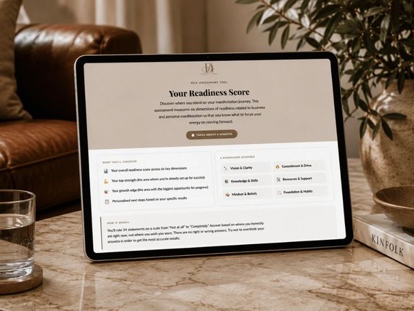 Tablet on marble table with a readiness score assessment screen.
