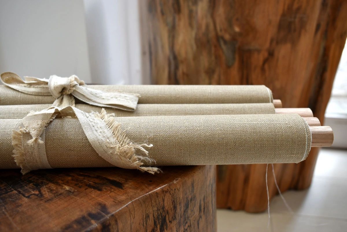 Scrolls of Linen and Tasmanian Oak. Designed by Da Claong.