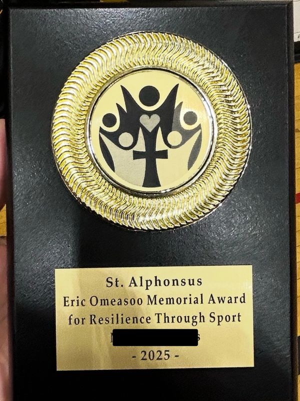 St. Alphonsus Eric Omeasoo Memorial Award for Resilience Through Sport plaque for 2025.