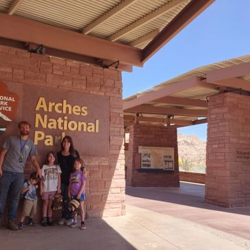Fountain City Asphalt founder Nathan Athans with his family, showcasing the values of dedication and community that drive the company."