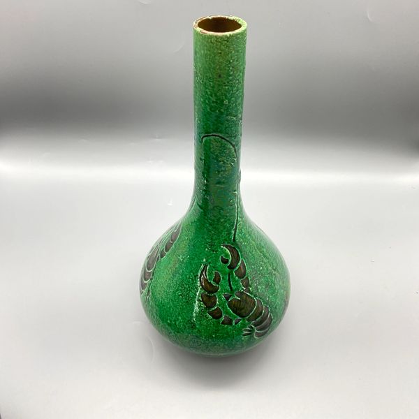 Designed by Fredrick Hurton Rhead for Liberty and made by Warlde arts and crafts green bottle vase