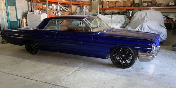 1962 Pontiac Bonneville Custom paint, GM engine and transmission, new suspension, wheels and tires.