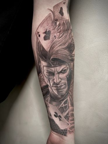 Tattoo Art and Republic   Gambit best tattoo, best X Men. Best black and grey tattoo by Andres Carba