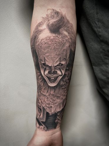Tattoo Art and Republic Best Pennywise realism tattoo  by Andres Carballo, fine details.