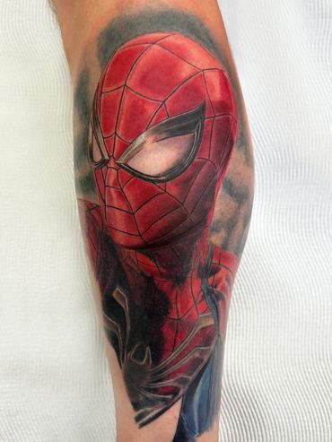 Best Spider-Man color realism tattoo, by Andres Carballo Tattoo Art and Republic. Marvel tattoo.