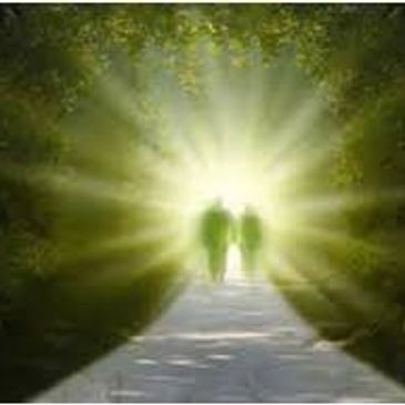 Two figures walking toward a bright, glowing light at the end of a path.