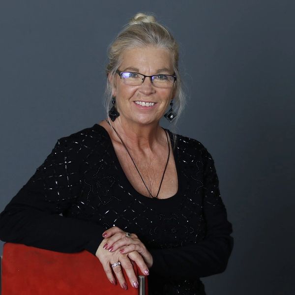 Suzette Conner Financial officer looking on the head