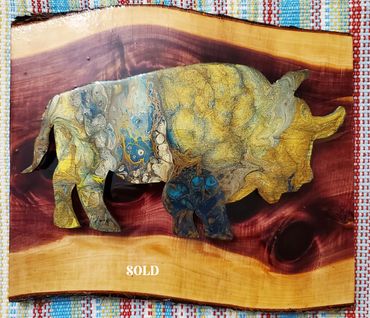 12x12 
raised wood buffalo on cedar
$125