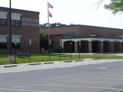 View of Atholton High School building and empty parking lot.