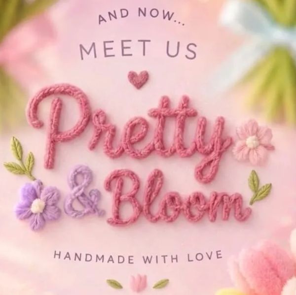 Handmade embroidery text saying Pretty &amp; Bloom with flowers and love theme.