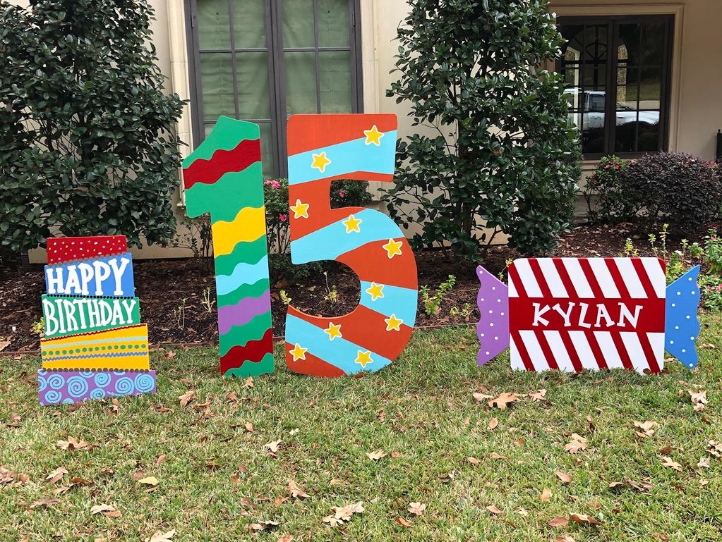 Colorful yard signs celebrating Kylan's 15th birthday.