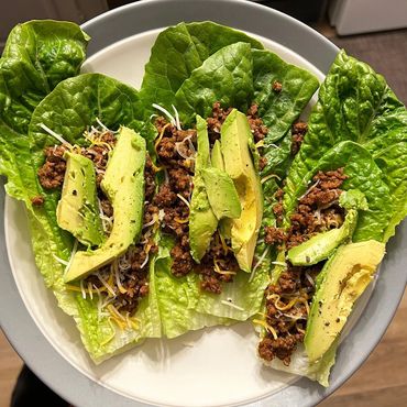 lettuce tacos with seasoned ground beef and avocado