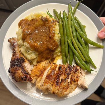 roasted chicken with mashed potatoes and gravy, and green beans