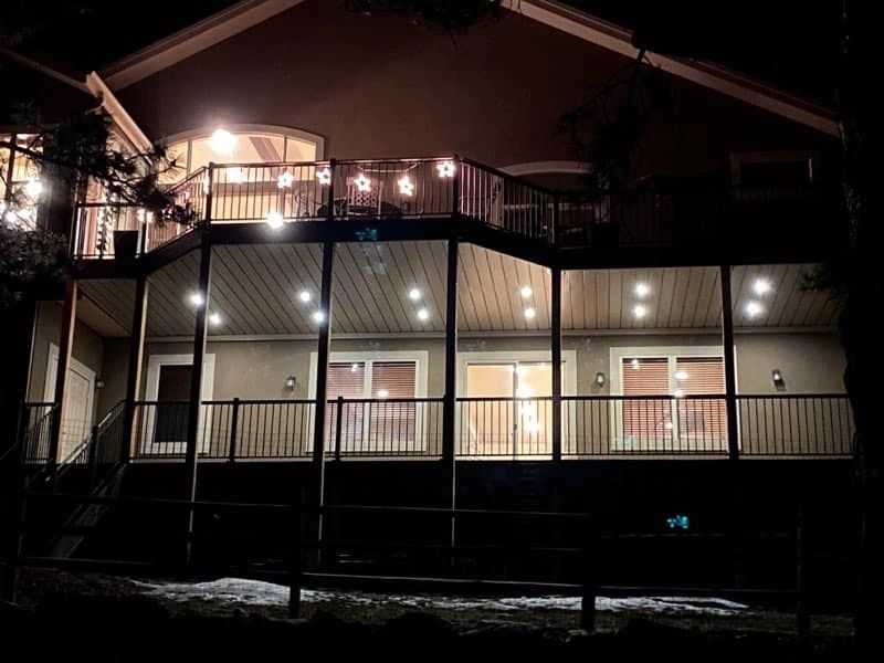 Exposed deck over a dry deck with lights.