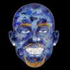 Abstract human face with surreal, glowing features in blue and yellow.